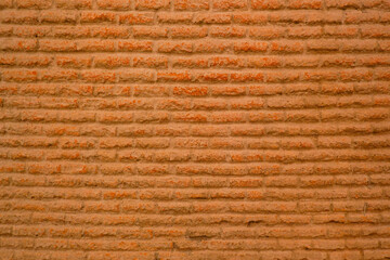 Dark brown antique red brick wall and red brick wall background.