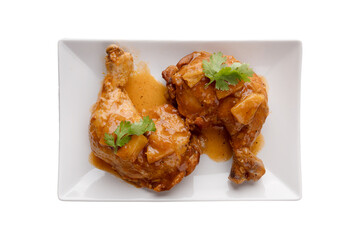 chicken wings roasted on white plate and white background top view.