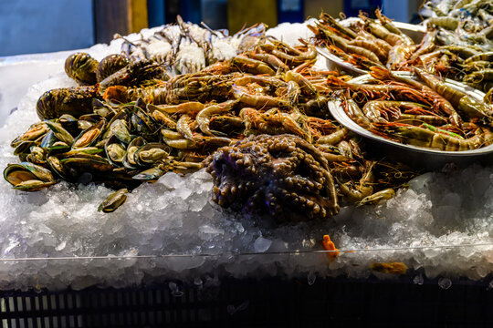 Raw shrimps and octopus for sale at the street market