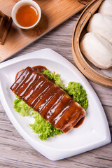 chinese traditional kong bak bao mantou sliced braised pork belly with dark soy sauce with steamed fresh white bun dim sum menu