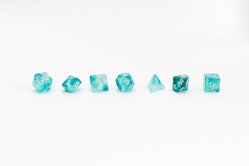 aquamarine dices for fantasy dnd and rpg tabletop games. Board game polyhedral dices with different sides isolated on white background	
