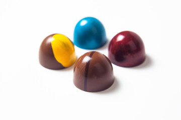 mexican Colorful chocolate candy bonbons and ingredients on white background