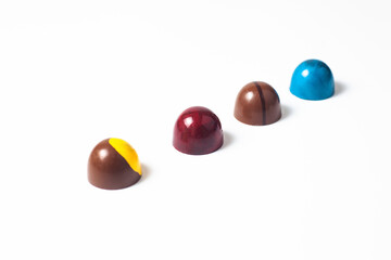 mexican Colorful chocolate candy bonbons and ingredients on white background