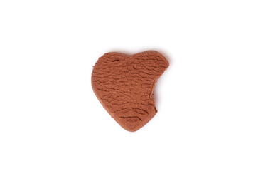 A broken heart. A half-bitten chocolate heart-shaped cookie