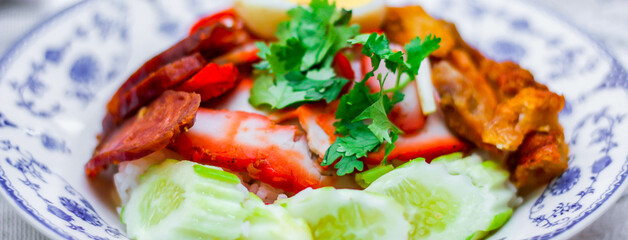 Rice with Red Roast Pork Served Boiled Egg and topped with Sweet Sauce.