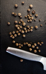 Black peppercorn on a dark background