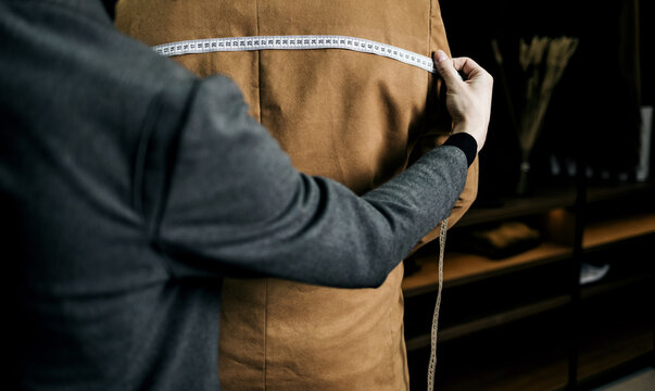  tailor fitting bespoke suit