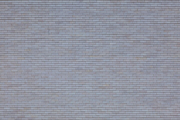 Background image - The texture of the wall of gray bricks