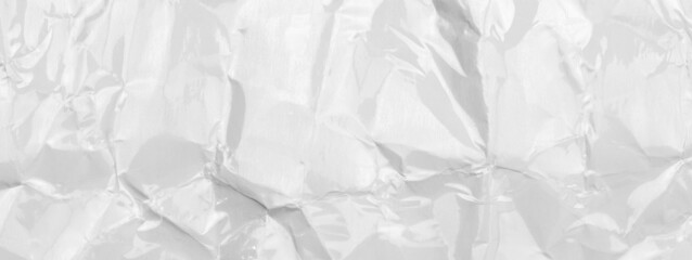 Abstract glossy white wrinkled paper background 