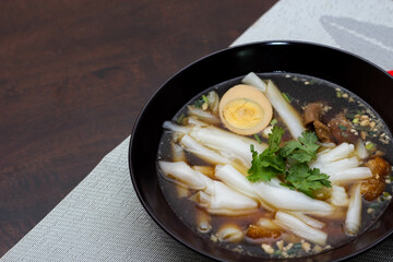 boiled Chinese pasta square, Rolled Rice Noodles or Noodle and Kuayjub Shop. what we call in thai  