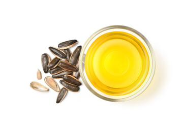 Flat lay of Sunflower oil with seeds isolated on white background.