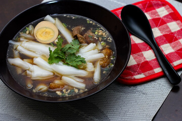 boiled Chinese pasta square, Rolled Rice Noodles or Noodle and Kuayjub Shop. what we call in thai  