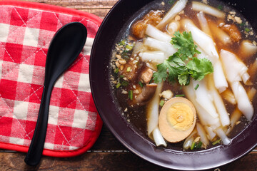 boiled Chinese pasta square, Rolled Rice Noodles or Noodle and Kuayjub Shop. what we call in thai  