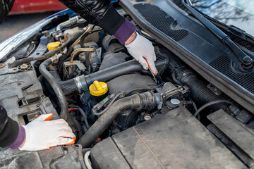 the owner of an expensive car brought his own car for repair in a car service with repair.