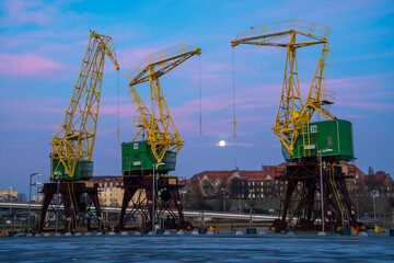 Old Cranes in Szczecin during the beautiful Morning - obrazy, fototapety, plakaty