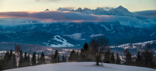 Mountain, winter panorama during a dramatic sunrise