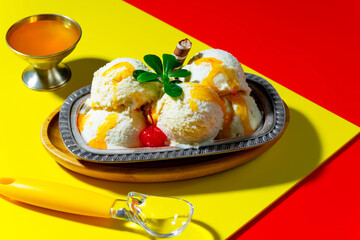 Ice cream balls with spoon