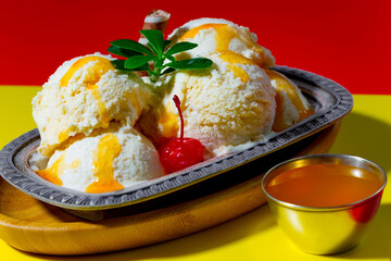 Ice cream on the table on a bright, colored background