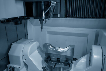 The 5-axis machining center table-tilt type cutting the injection mold parts by solid ball end mill tool.