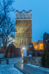 Dusk view on Opatow gate. Entrance gate to Sandomierz old town in Poland.