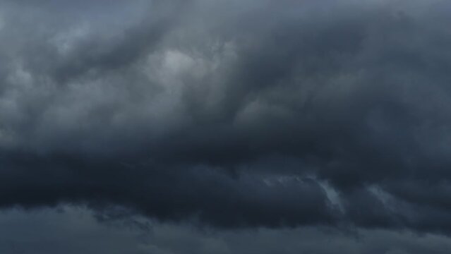 beautiful dark dramatic sky with stormy clouds time lapse before the rain or snow, winter season
