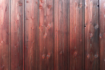 Wooden boards with wood texture for background. Dark reddish plank wall. High quality photo