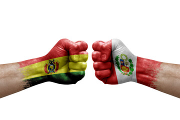 Two hands punch to each others on white background. Country flags painted fists, conflict crisis concept between bolivia and peru - obrazy, fototapety, plakaty