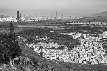 Skyline of downtown district of Shenzhen and rural village in Hong Kong