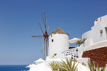 Windmill on Santorini island holidays in Greece travel traveling Oia town Mediterranean Sea Santorin