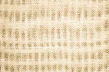 Fototapeta na wymiar Jute hessian sackcloth burlap canvas woven texture background pattern in light beige, cream, brown color blank. Natural linen and cotton cloth decoration.