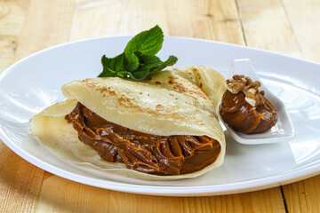 Delicous pancake with fruit jam