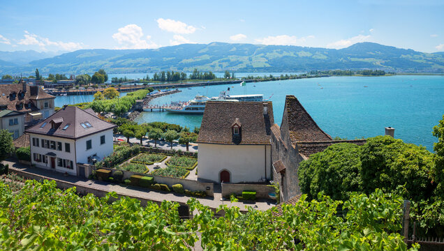 view from Rapperswil castle to the harbor and dam between lake Zurichsee and Obersee, switzerland