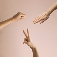 Silhouette of Hands Gesture for Rock Paper Scissor Game, isolated on pink background.