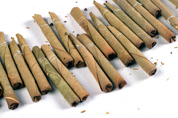 bidi, you can say it as desi or Indian cigarette, made of dry leaves 