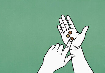 POV hand holding coins on green background

