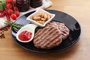 Grilled beef burger cutlet with sauce