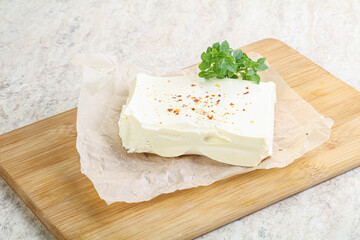 Greek Feta cheese over board