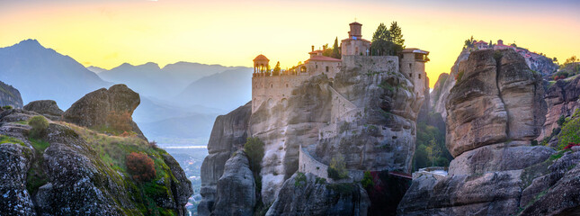 Majestic view of famous Eastern Orthodox monasteries at sunset, place listed as a World Heritage site, Greece, Europe. landscape place of monasteries on the rock.