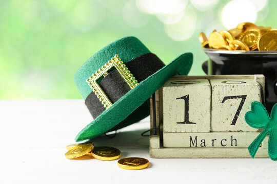 St Partick's day concept - pot of gold, calendar, hat