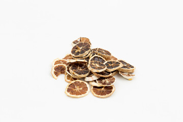 dried lemon slices on a white background
