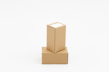 Two closed cardboard boxes on a white background