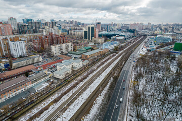 Fototapeta premium Cityscape with railway tracks in Kyiv, Ukraine.
