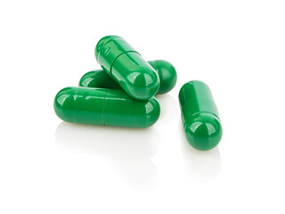 Heap of green medical capsules - 487064126