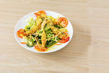 Japanese Cuisine - Tempura Shrimps shrimp in tempura with lemon slices and salad