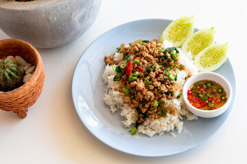 Rice topped with stir-fried pork and basil, Thai food