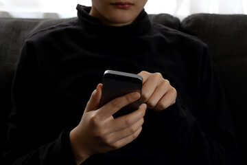 Teen mental health problem, social media harassment concept. A preteen schoolboy, teenager using...