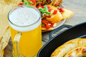 Beer drink bruschetta sausages pizza. appetizer, snack for beer.