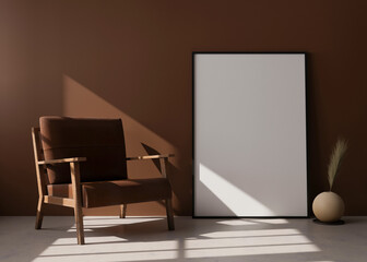 Empty vertical picture frame standing on the floor in modern living room. Mock up interior in contemporary style. Free space for picture, poster. Brown armchair, vase with pampas grass. 3D rendering.