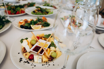 Food on the table. Dishes. Wedding table. Serving.