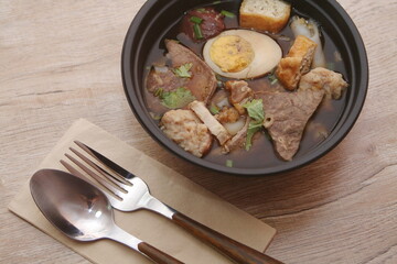 Rolled Rice Noodles in Five-spices Broth or Crunchy Pork Soup, what we call 